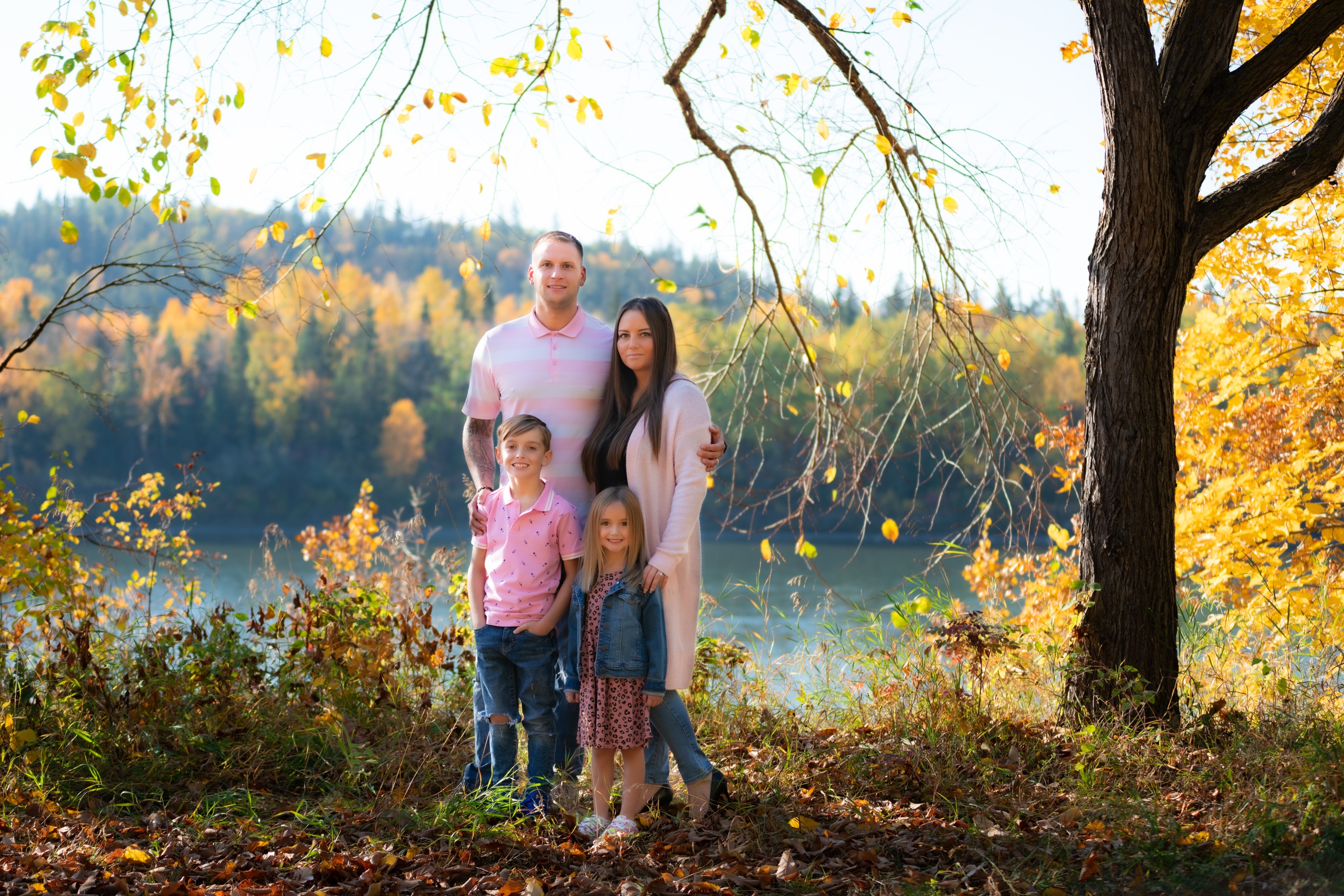 Family portrait by the river
