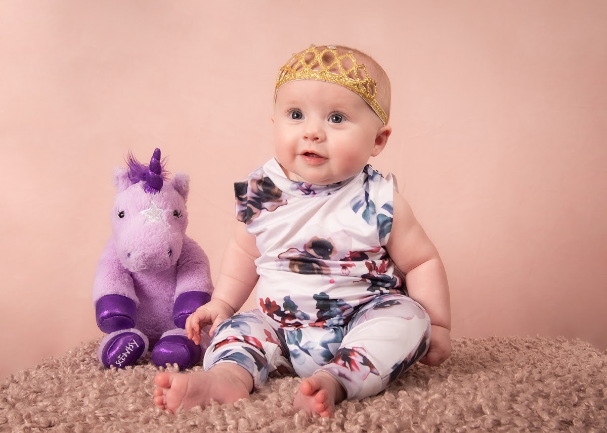 Baby milestone portrait with a unicorn