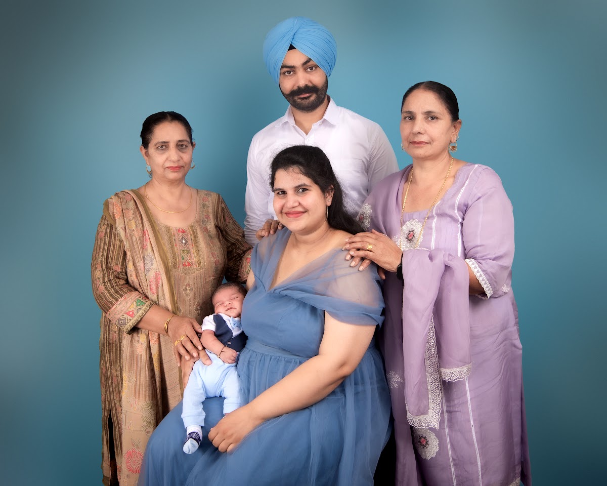 Family portrait with a newborn baby