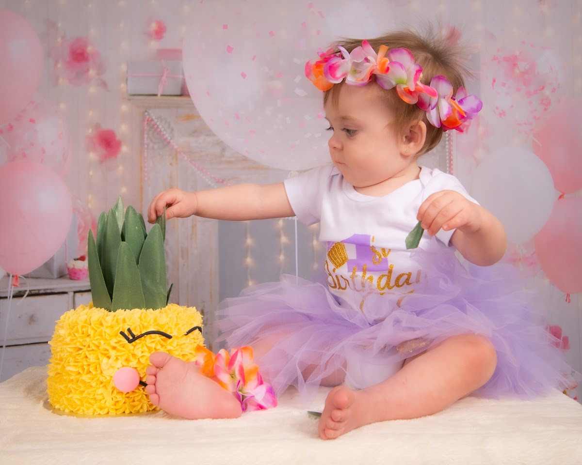 First birthday cake smash portrait with a pineapple cake